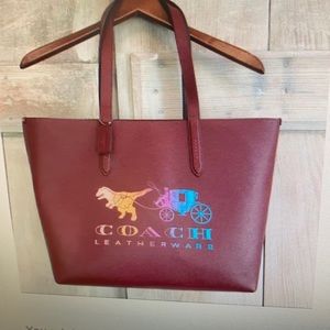 Rexy red leather tote bag, with the rainbow Dino.